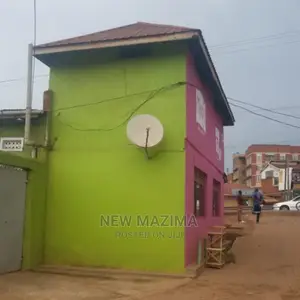 Busy Commercial Shops Measuring Direct on Tarmac of Ntebe Rd