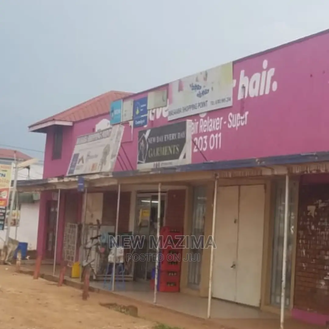 Busy Commercial Shops Measuring Direct on Tarmac of Ntebe Rd
