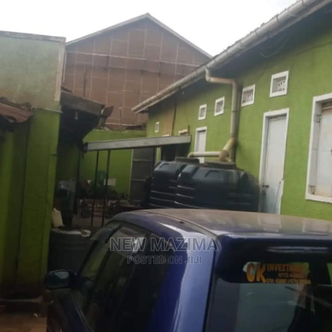 Busy Commercial Shops Measuring Direct on Tarmac of Ntebe Rd
