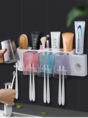 Toothpaste Dispenser and Toothbrush Holder