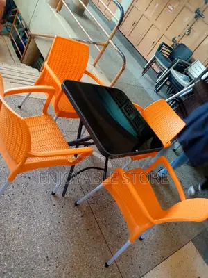 Plastic Chairs and Glass Table Square