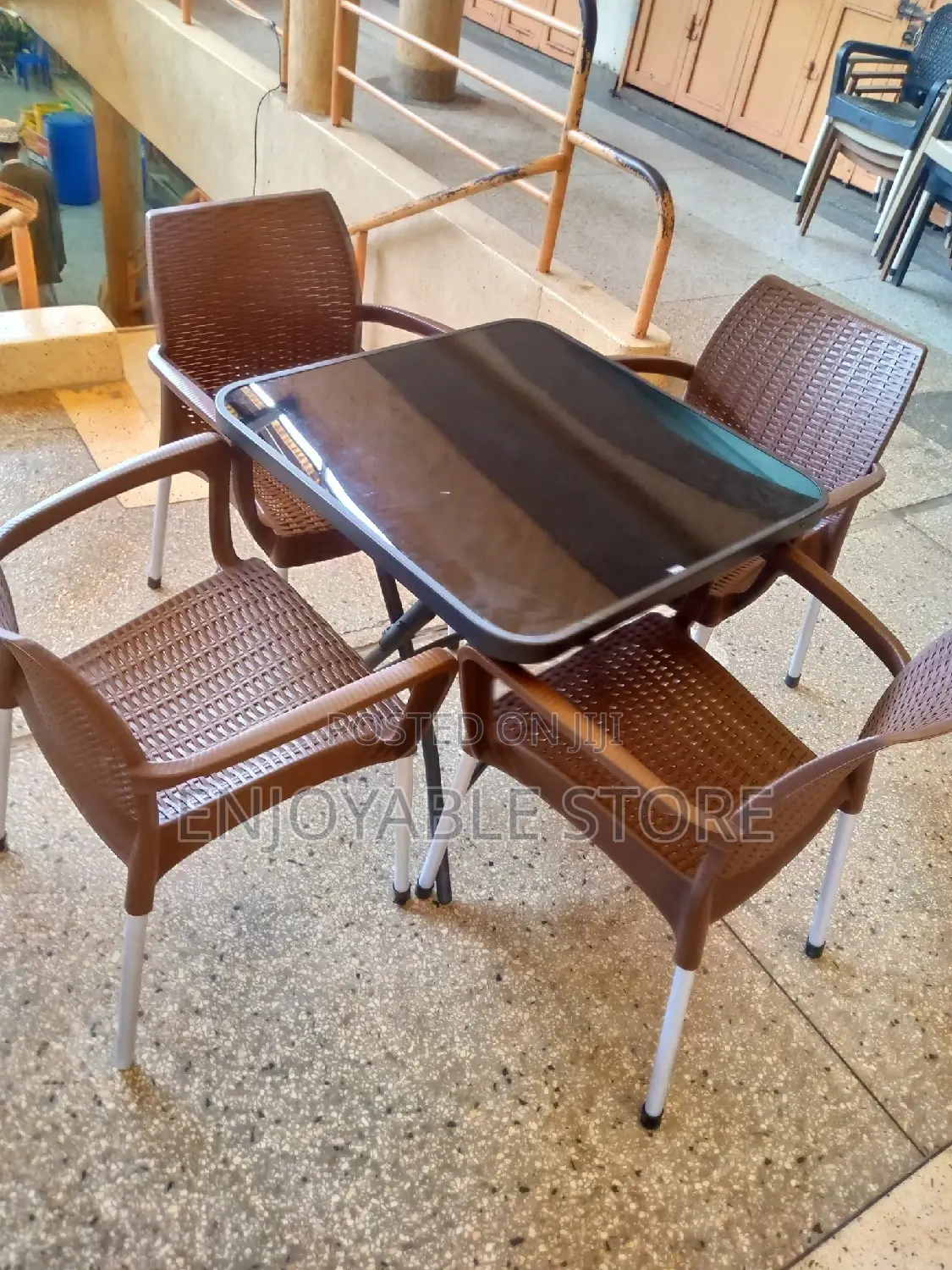 Plastic Chairs and Glass Square Table Set