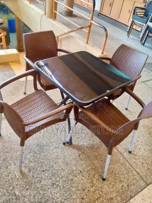 Plastic Chairs and Glass Square Table Set