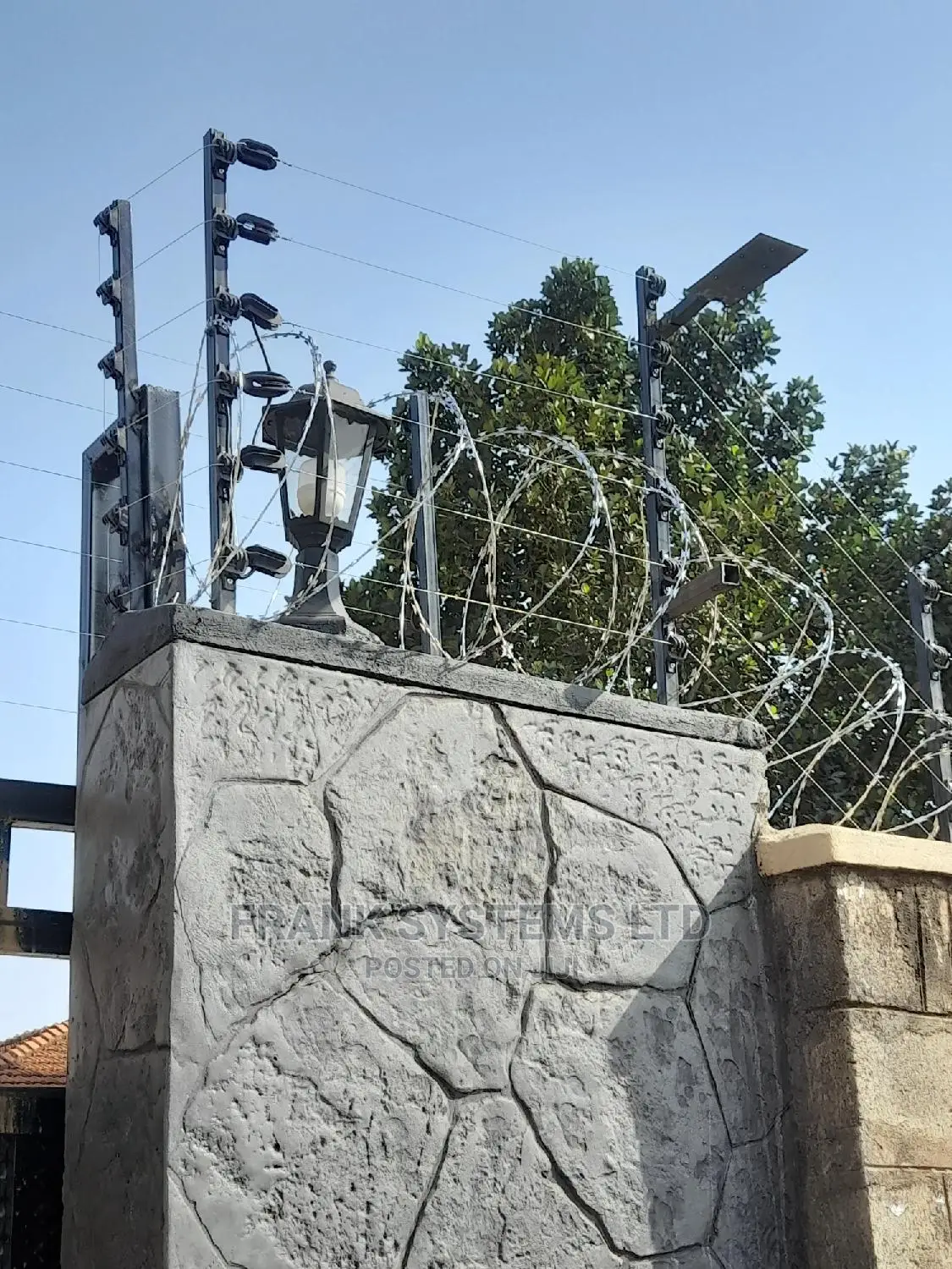 Electronically Fencing System With Razor Wire