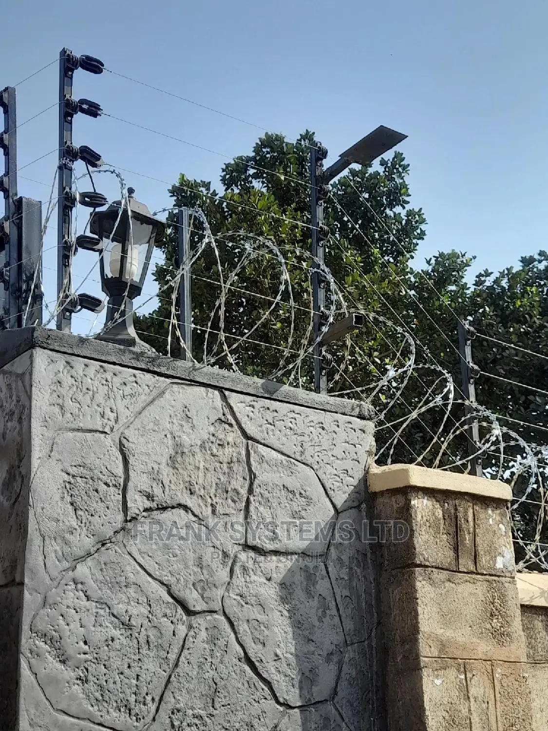Electronically Fencing System With Razor Wire