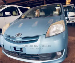 Photo - Toyota Passo Sette 1.5 AWD 2009 Teal