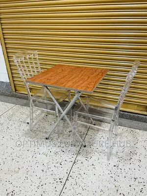 2 Transparent Chairs and Table