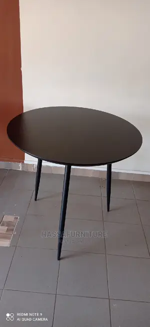 Photo - Wooden Dining Table Round Shape