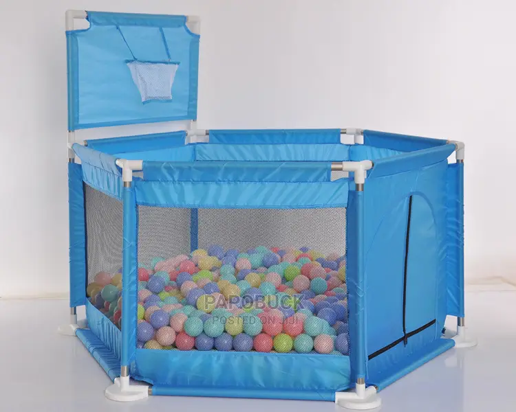 Kids Playpen With Balls and a Toy Car