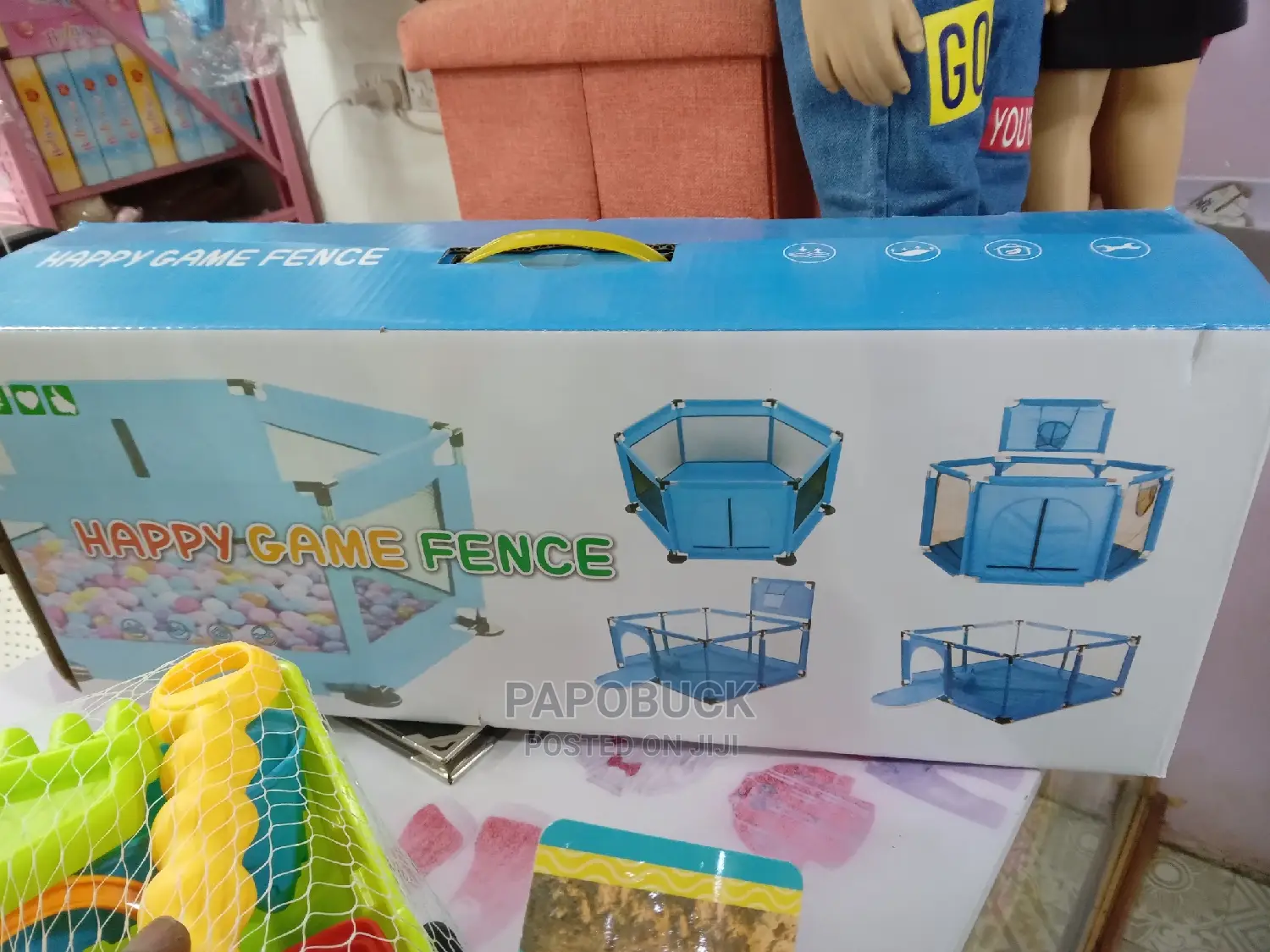 Kids Playpen With Balls and a Toy Car