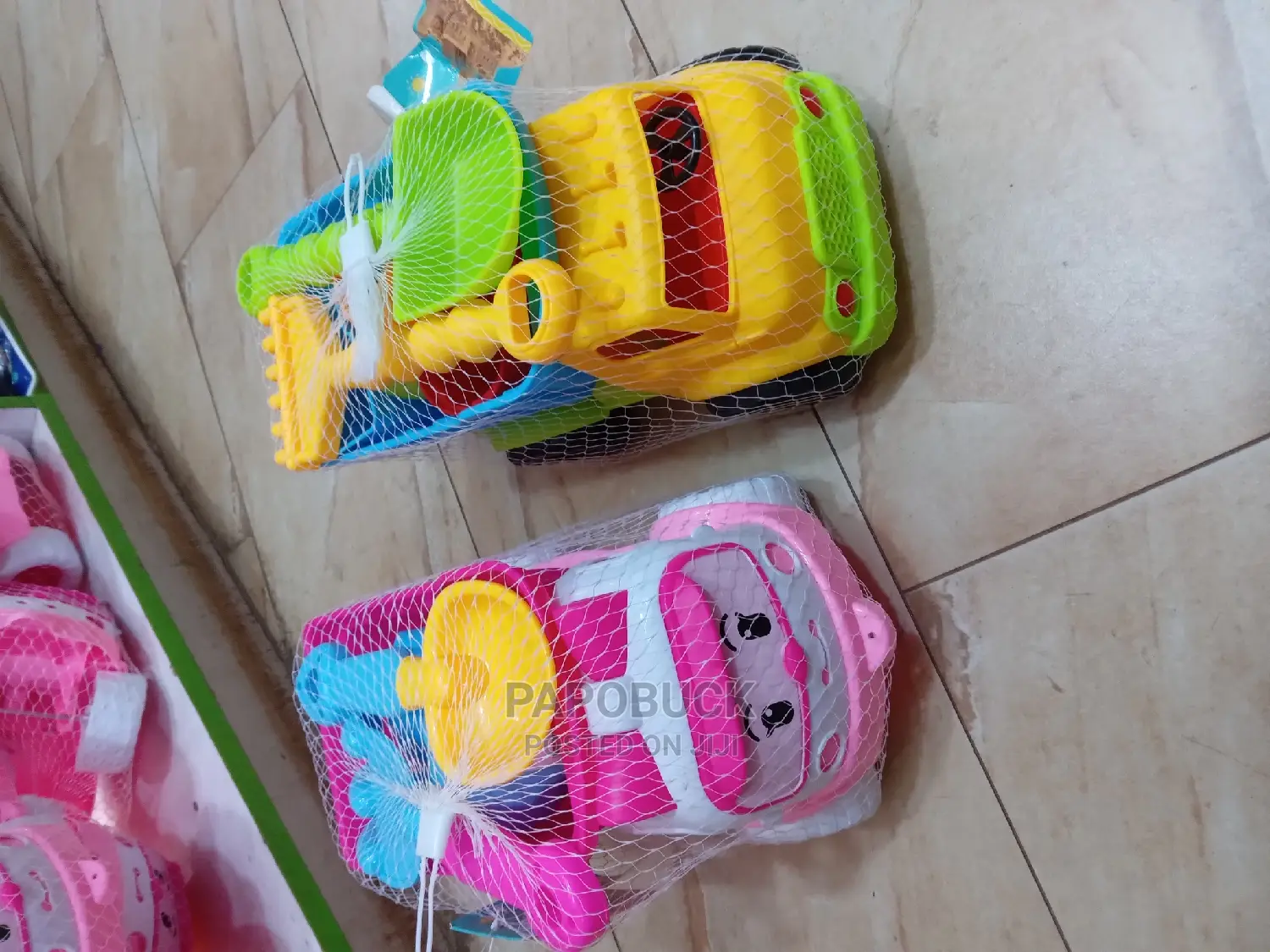 Kids Playpen With Balls and a Toy Car