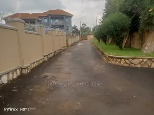 100by110ft Plot for Sale at Kisaasi