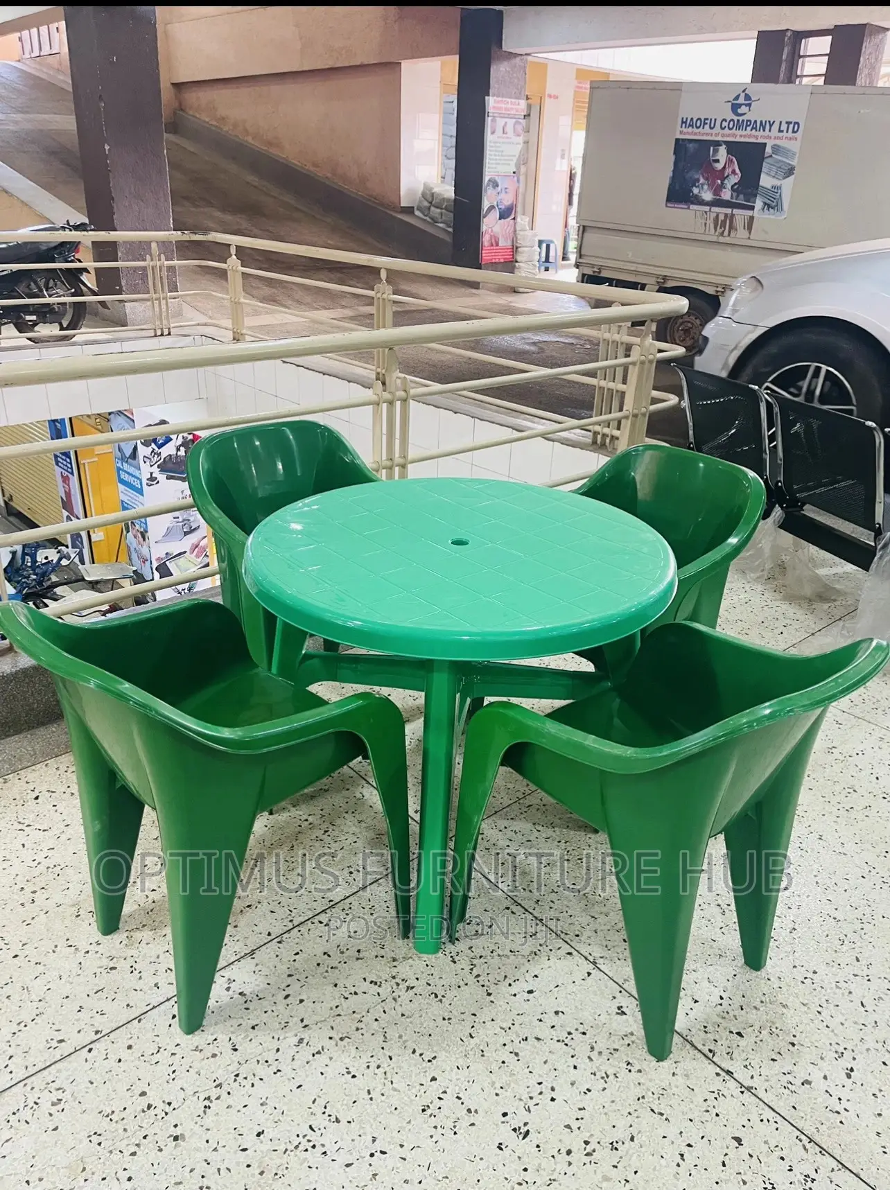 Plastic Table and Four Chairs