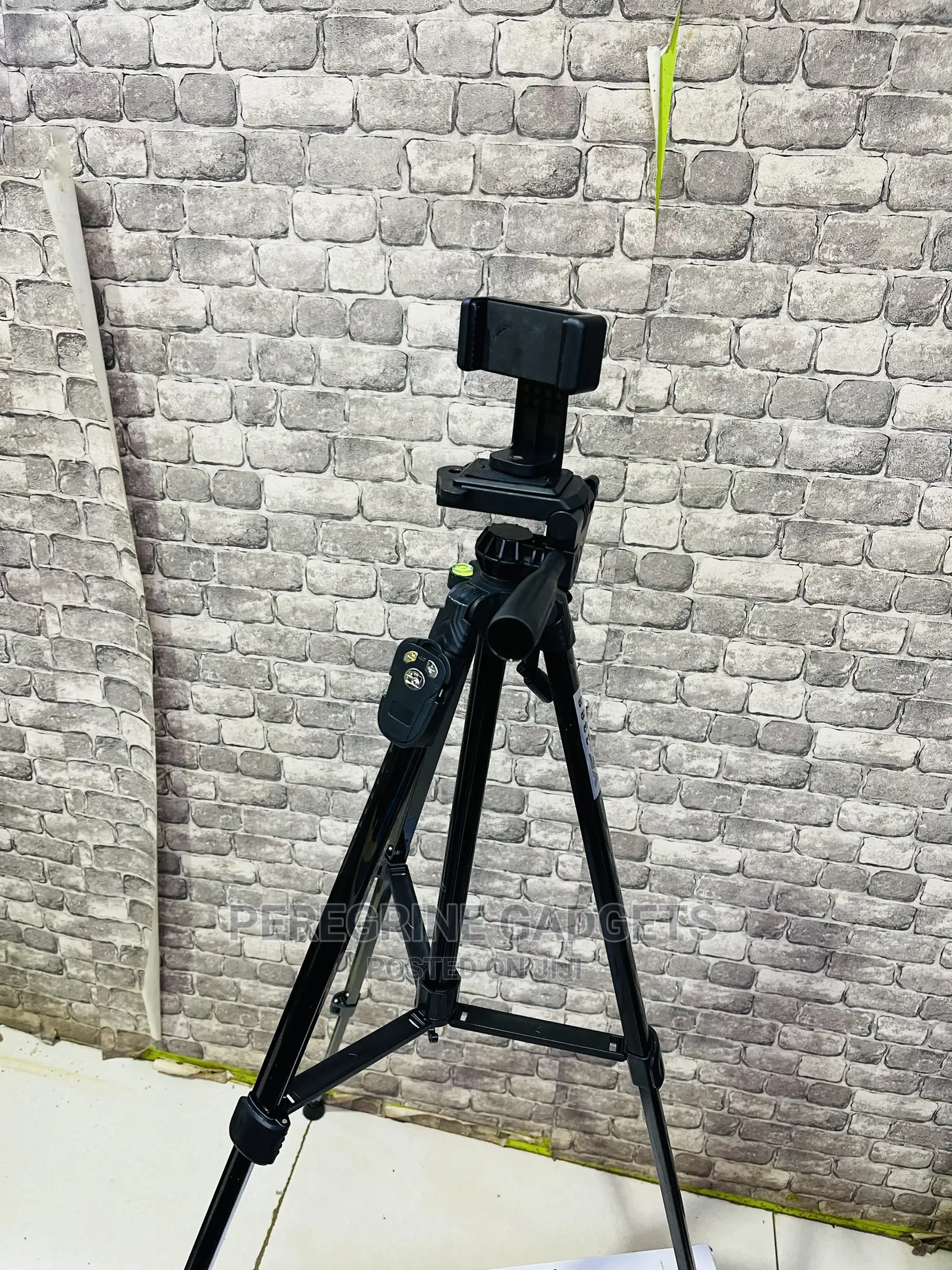 Yunfeng Tripod Stand 4 Phone and Camera With a Remote Remote