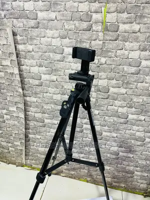 Yunfeng Tripod Stand 4 Phone and Camera With a Remote Remote