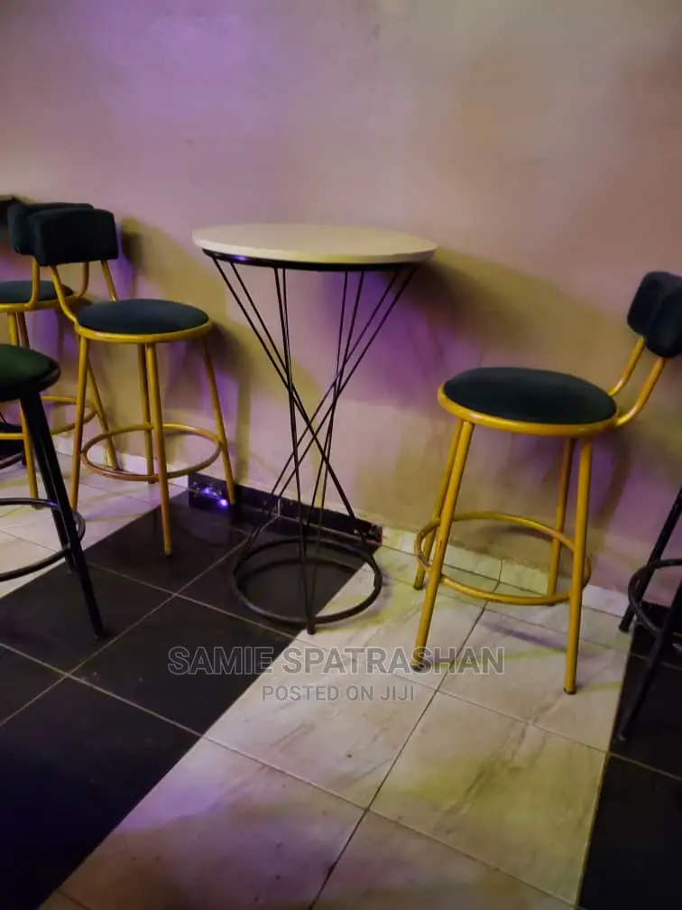 A Set of 2 Chairs and Atable