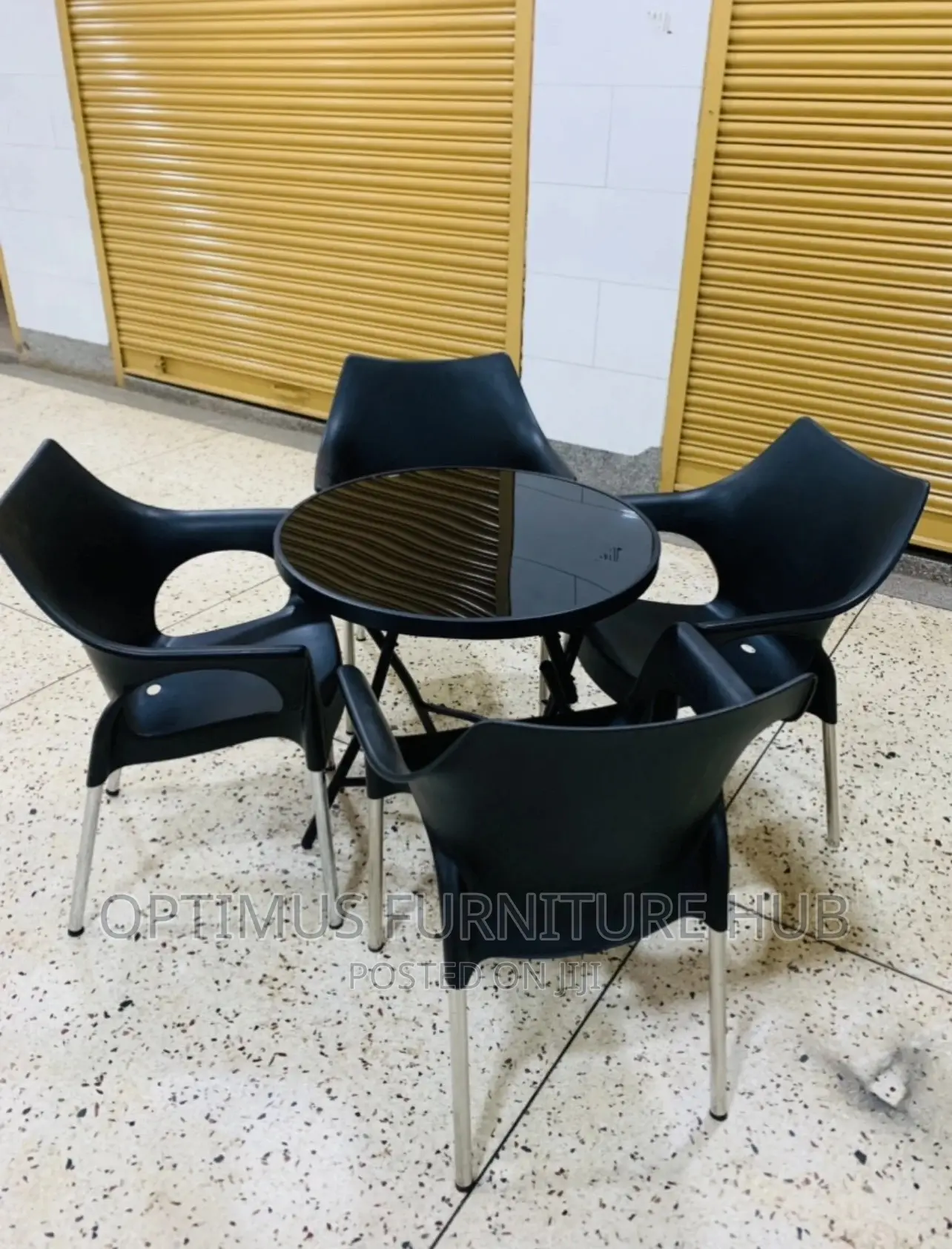 Glass Table and Four Chairs