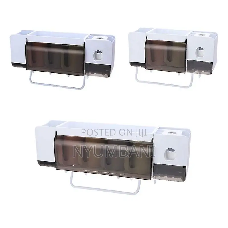 Tooth Paste Dispenser With Tooth Brush Holder