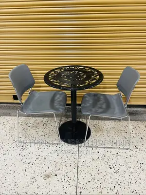 Round Table and Two Chairs