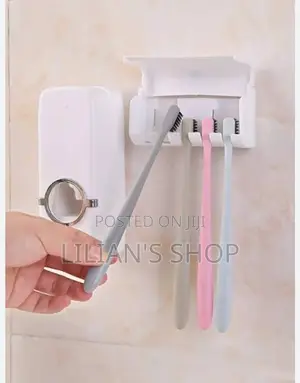 White Toothpaste Despenser and Toothbrush Holder Set