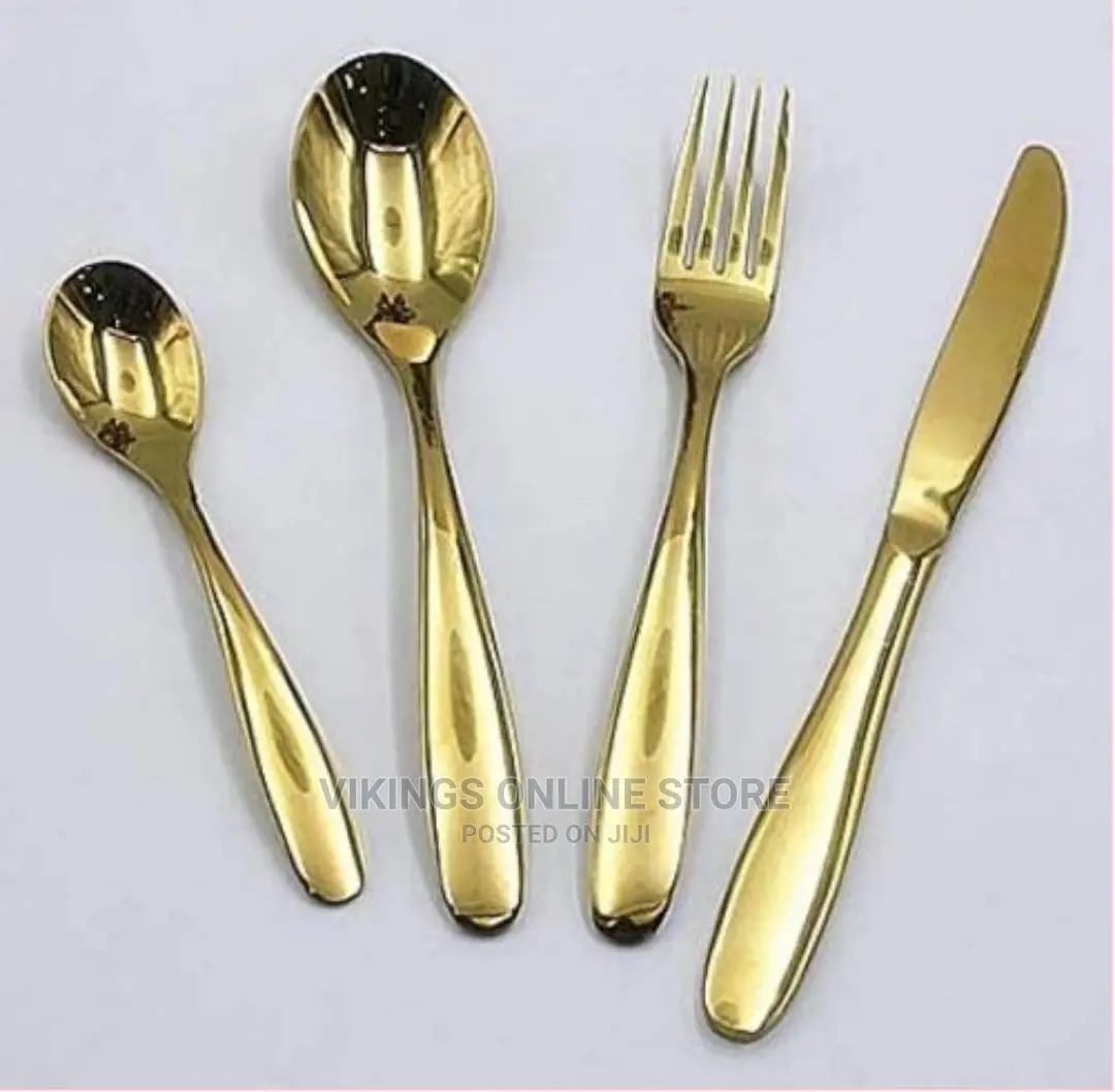 24 Pieces of Plain Cutlery (Forks,Spoons Knives) a Stand