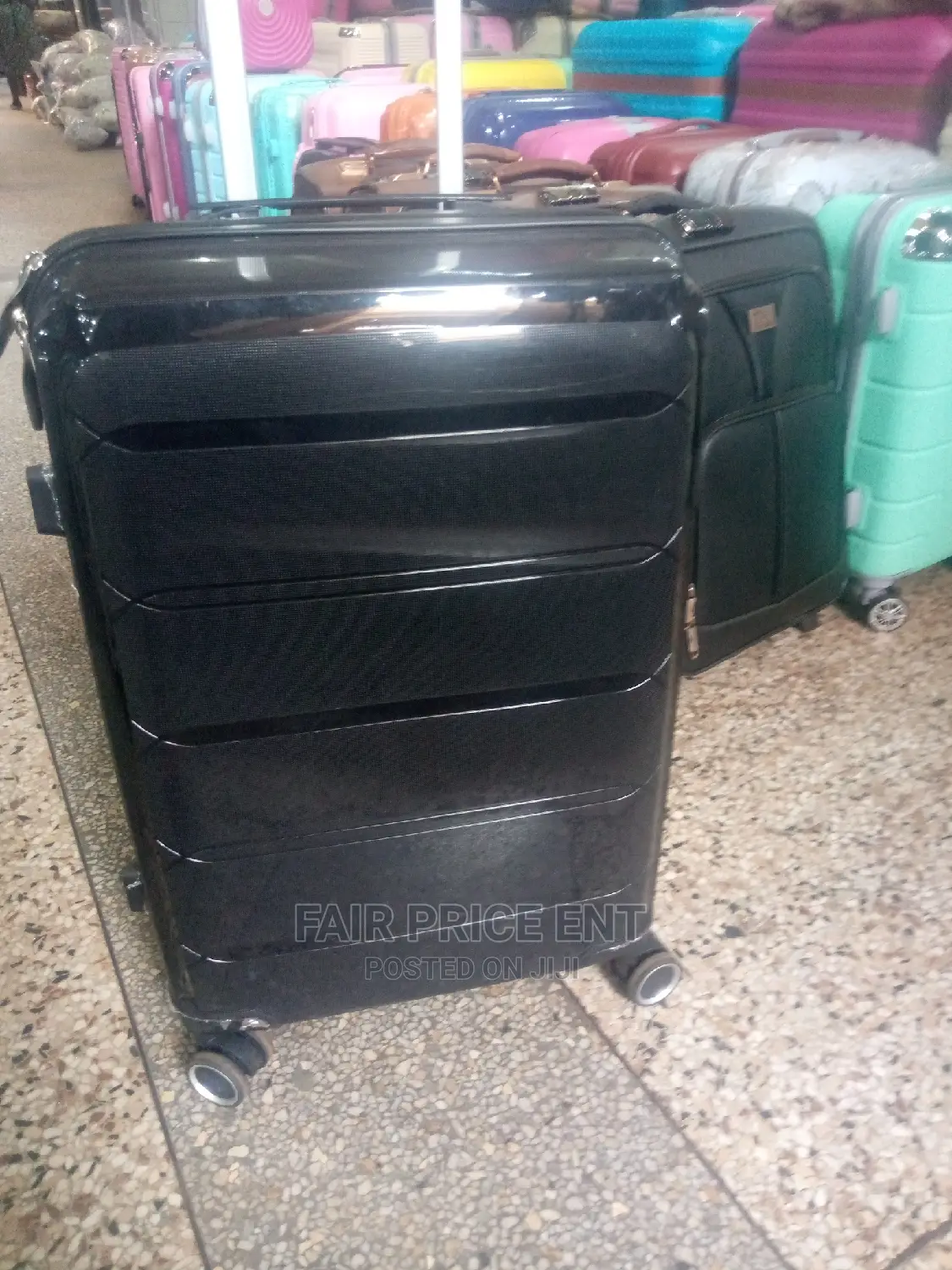 Original Rubber Plastic Traveling Suitcases. Medium.( Black)