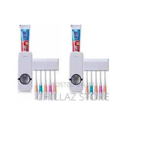 Bathroom Toothpaste Dispenser and Toothbrush Holder.