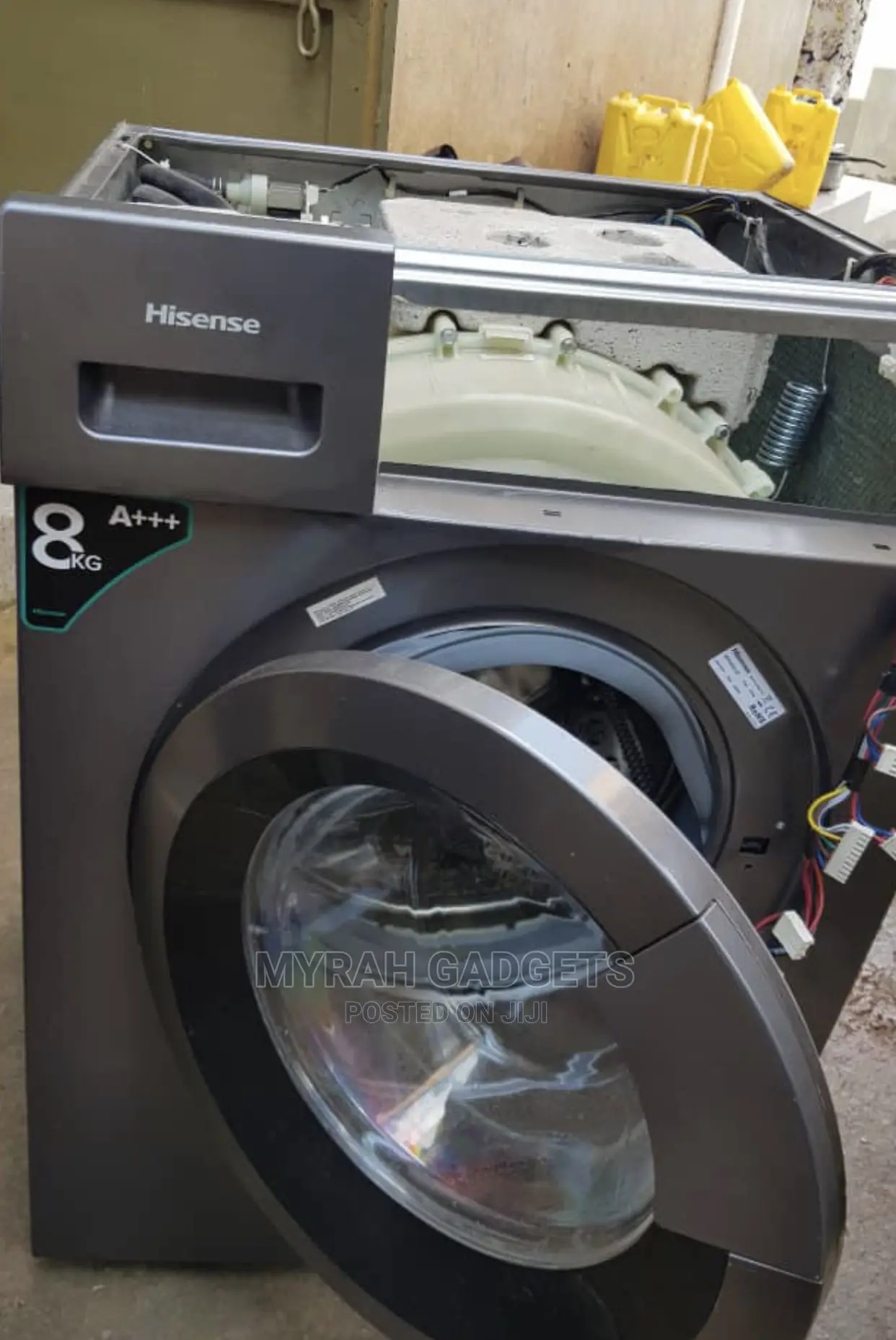 Technicians in Hisense Front Washing Machines Repairing.,: