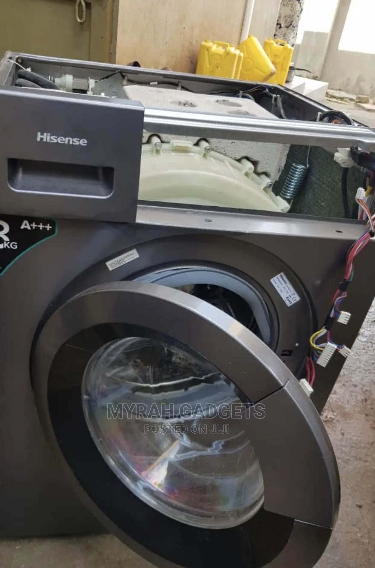 Technicians in Hisense Front Washing Machines Repairing.,: