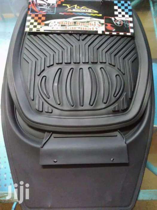 Car Carpets in Beige. Grey and Black