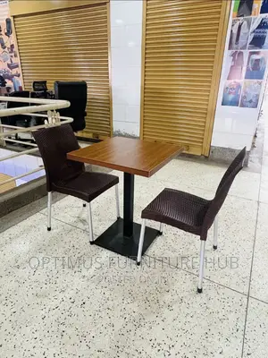 Table and 2 Brown Chairs