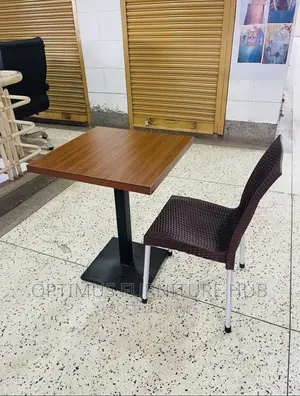Table and Brown Chair