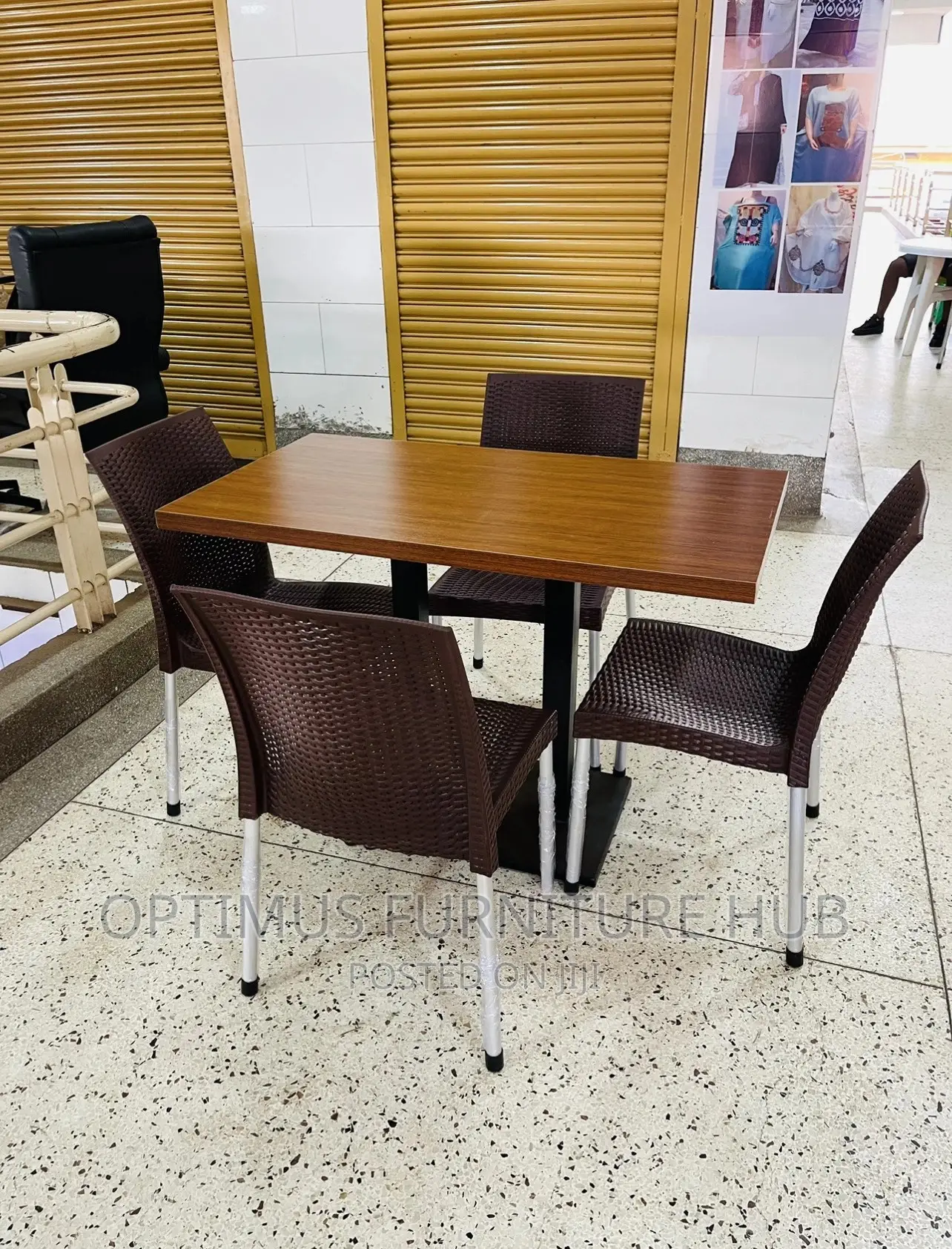 Table and 4 Brown Chairs