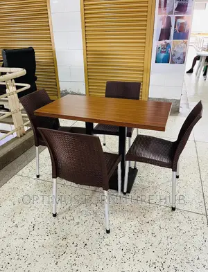Table and 4 Brown Chairs