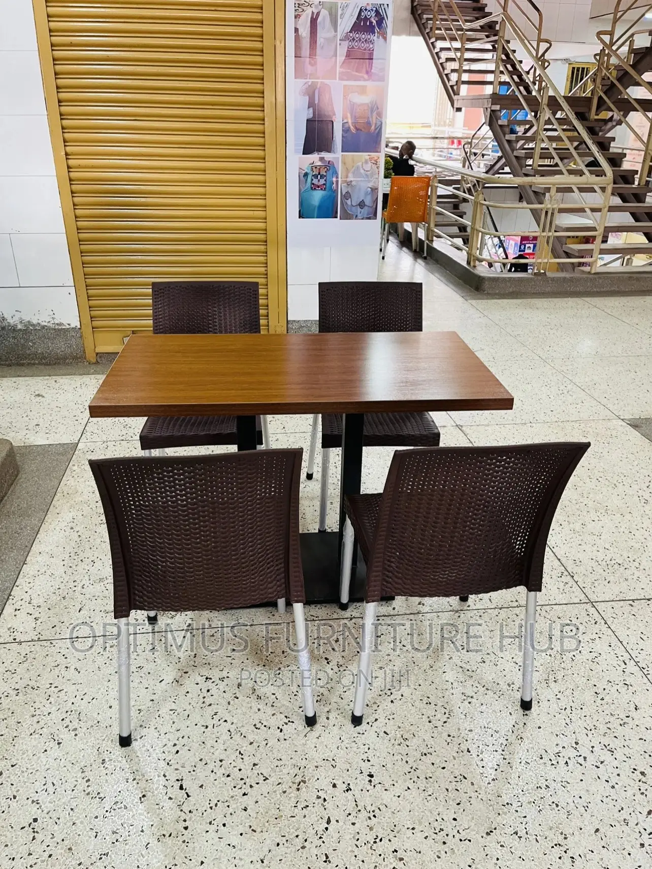 Table and 4 Brown Chairs