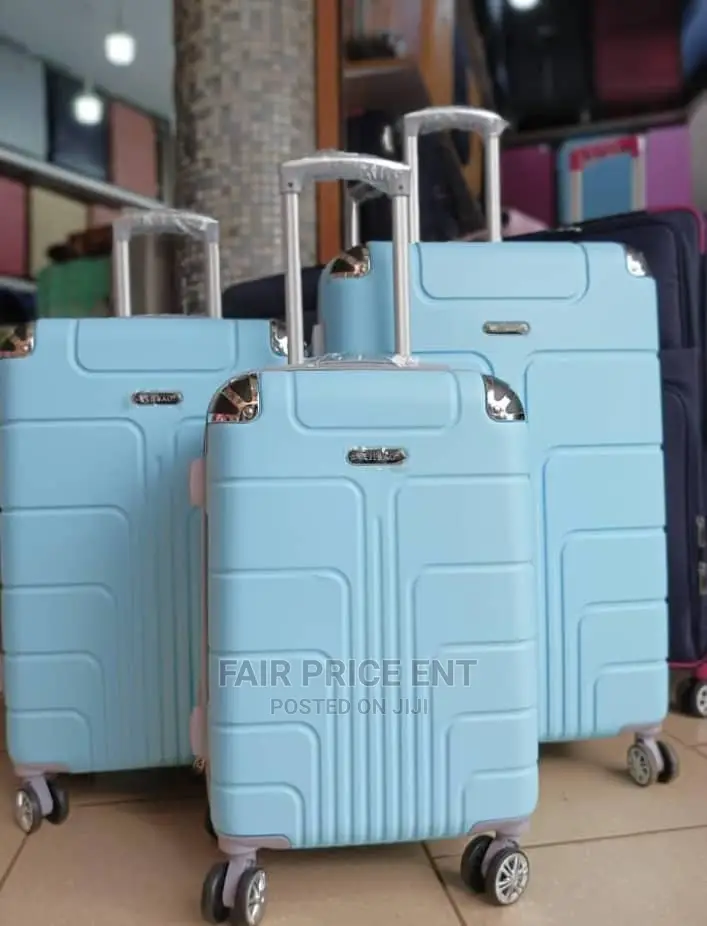 Executive Plastic Traveling Suitcases. Medium. (Blue)