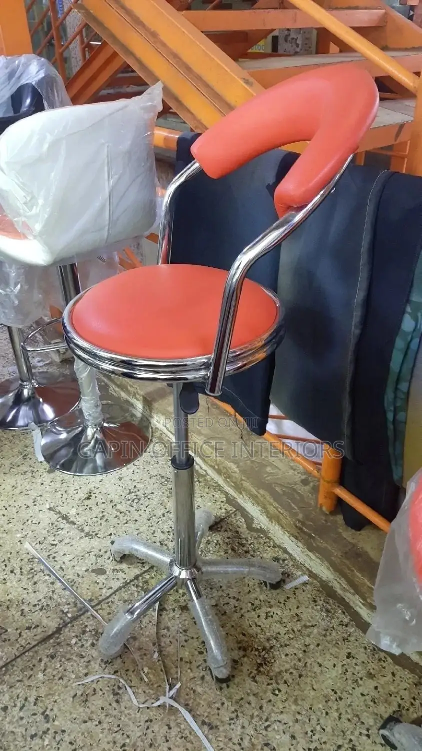 Orange Bar Stool With a Back