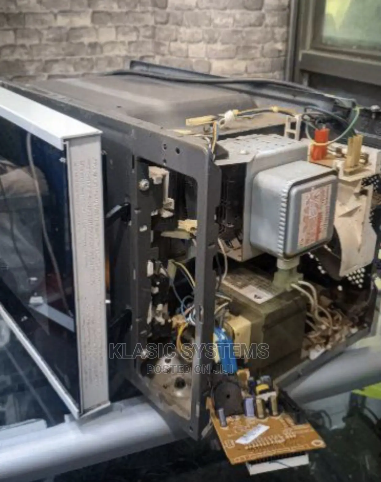 Microwave Repairing and Servicing at Klasic Systems.,:
