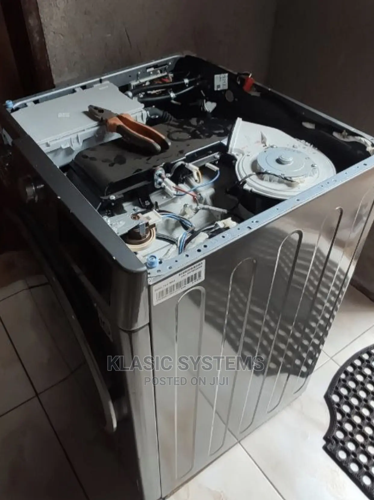 Washing Machine Repairing and Inspection at Klasic Systems .