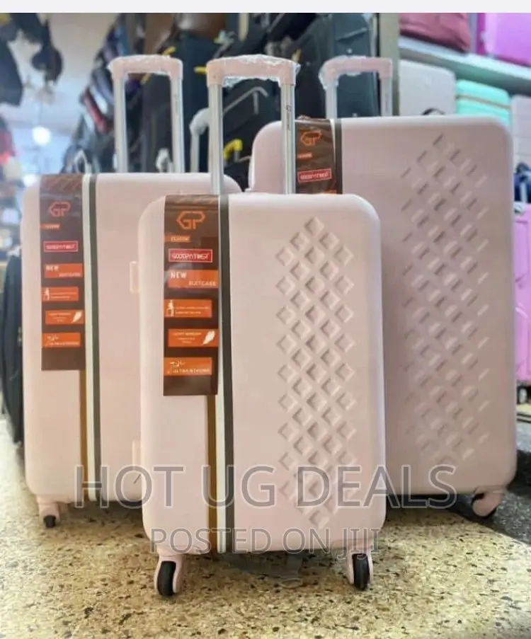 4 Wheel Spinner Plastic Travel Suitcases- Peach