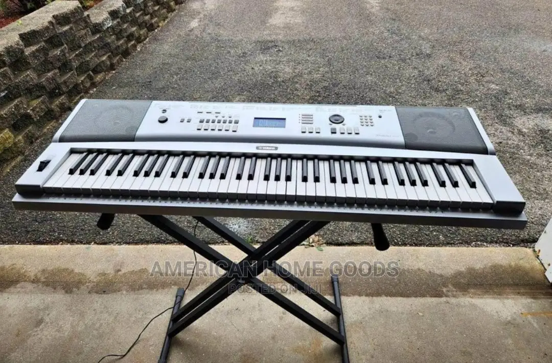 Yamaha Electronic 76-keys Portable Grand DGX230 Piano.
