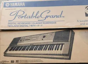 Yamaha Electronic 76-keys Portable Grand DGX230 Piano.