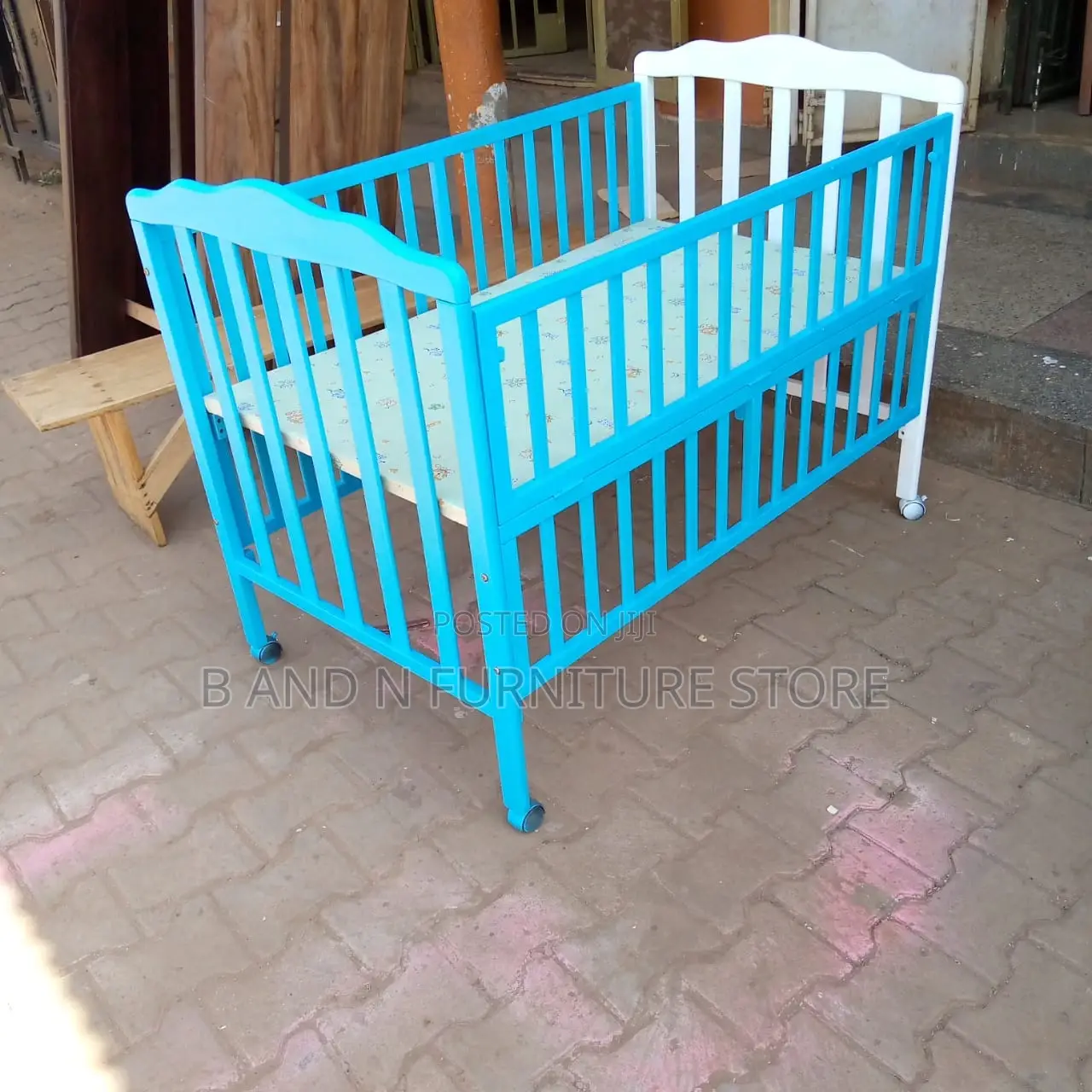 Baby Bed From a Combination of Mahogany Wood and Plywood