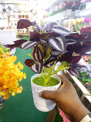 Photo - Nice Artificial Table or Home Decorators Flowers