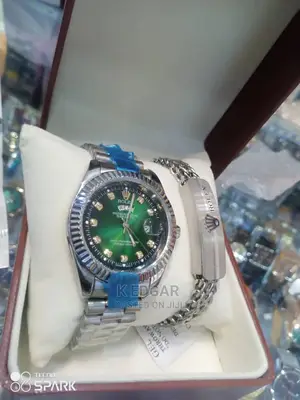 Silver Rolex Watch and Bracelet