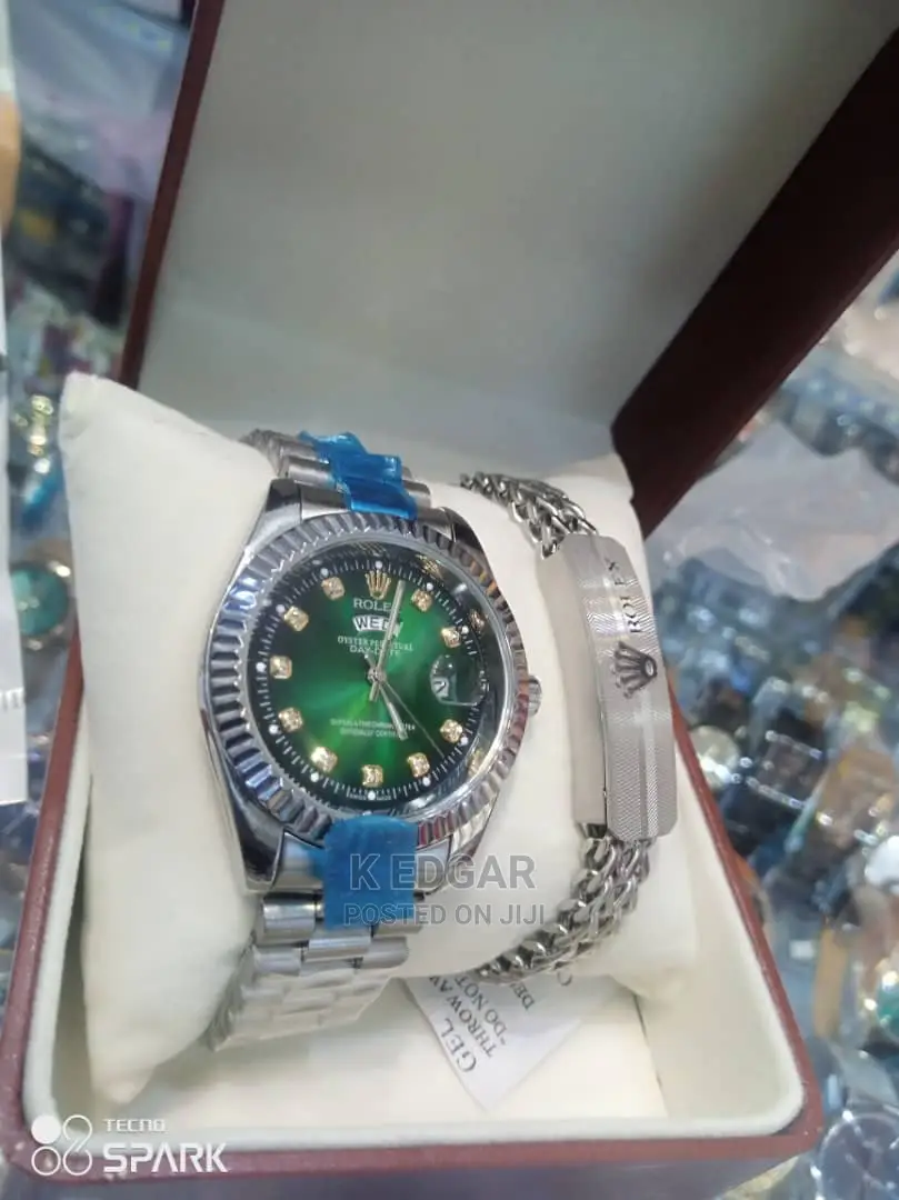 Silver Rolex Watch and Bracelet