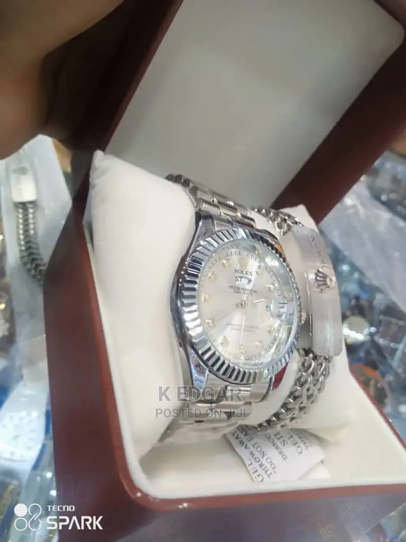 Silver Rolex Watch and Silver Bracelet