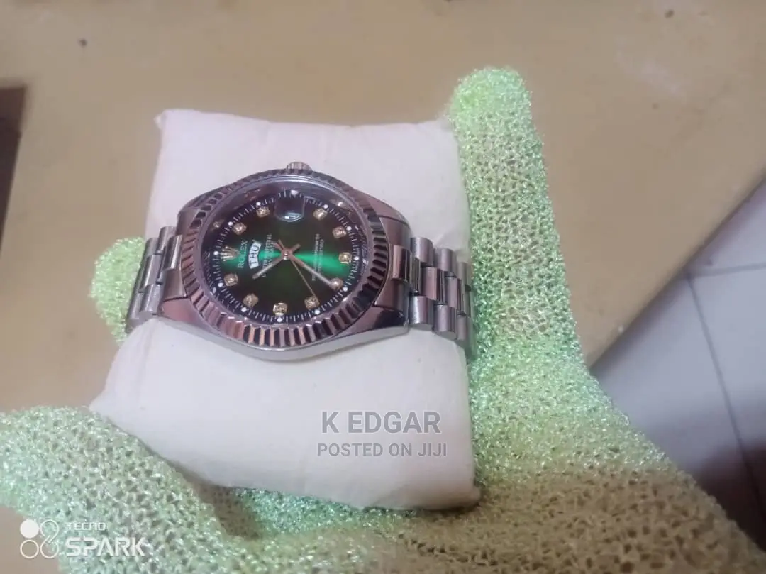 Silver Rolex Watch