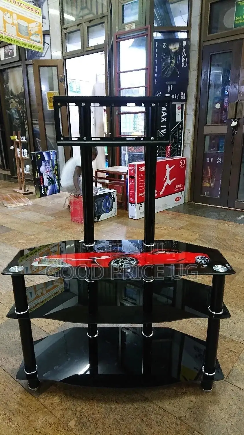 204 TV Stand With Wall Mount. Made Out of Glass and Steel.