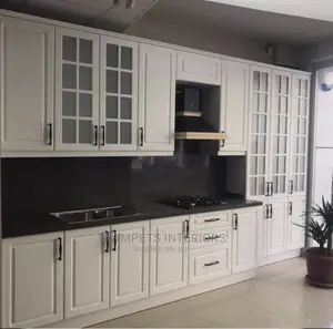 White Kitchen Cabinets/ Moulded Shutters Call